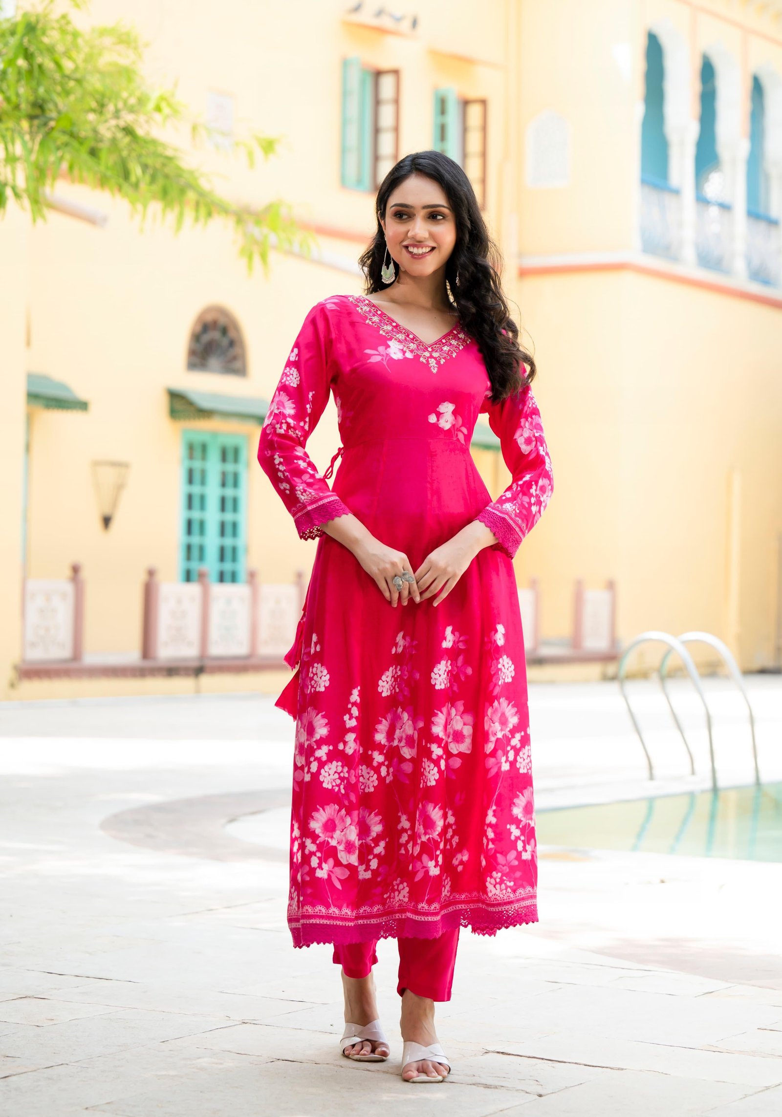 Beautiful pink placement printed anarkali with lacing & handwork on neck and Doris on both sides with solid pant and printed dupatta with tassels