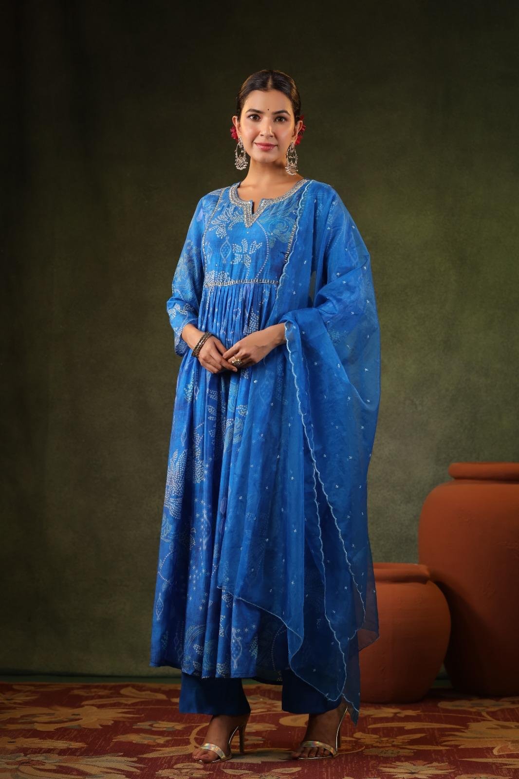 Attractive Blue Muslin Kurta with handwork on neck and yoke with solid chandon pant and thread work organza dupatta