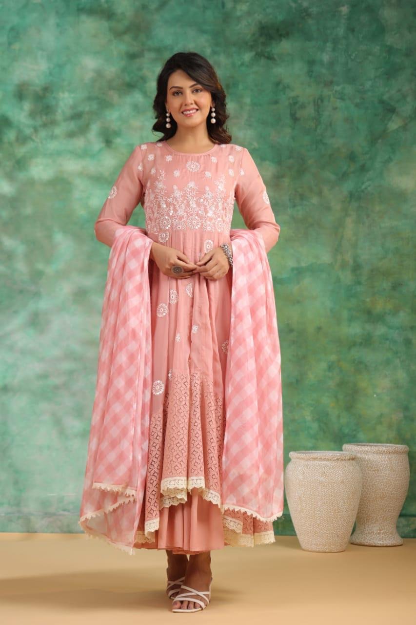 Beautiful flared organza gown with detachable inner and shrug with heavy embroidery. With dupatta