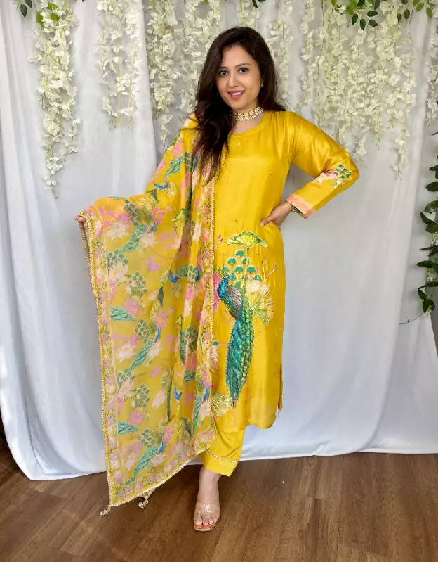 Vibrant shimmer yellow heavy work peacock A-Line Kurta with solid pants and printed dupatta with tassels on all sides