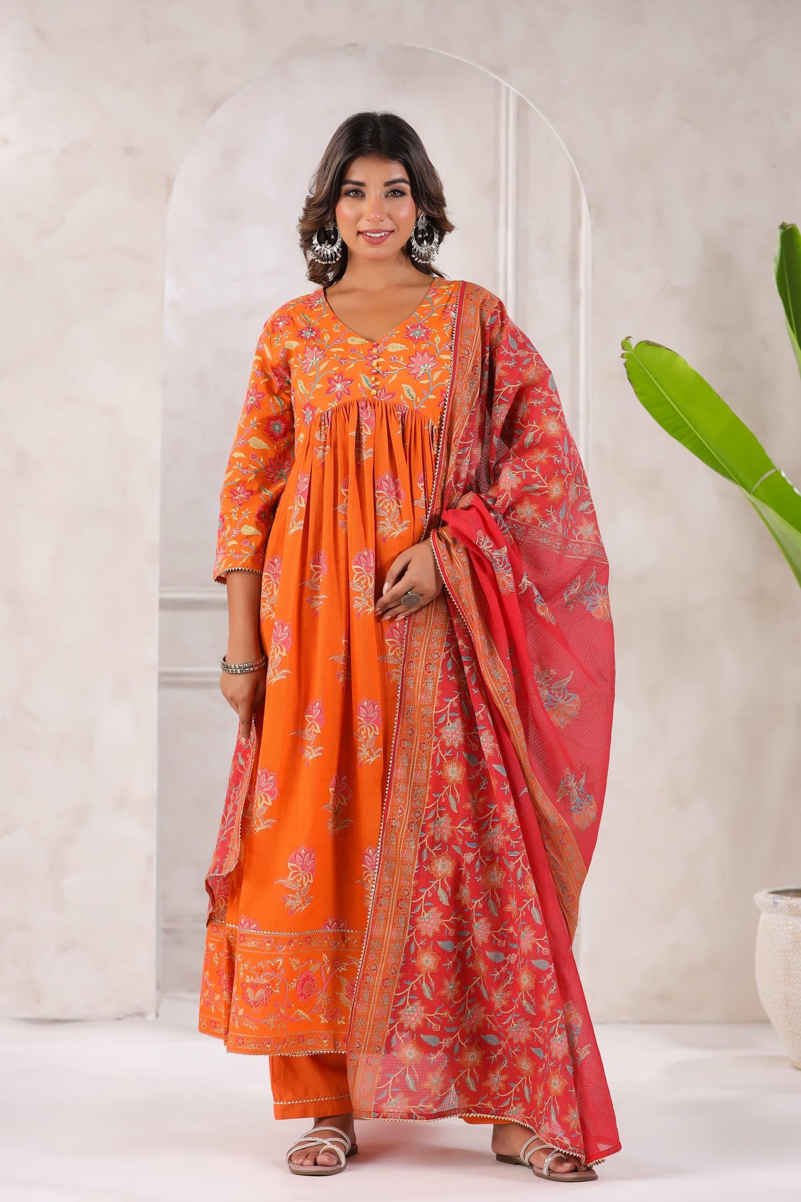 Vibrant orange Cotton organza inverted V style anarkali with solid pants and contrast dupatta